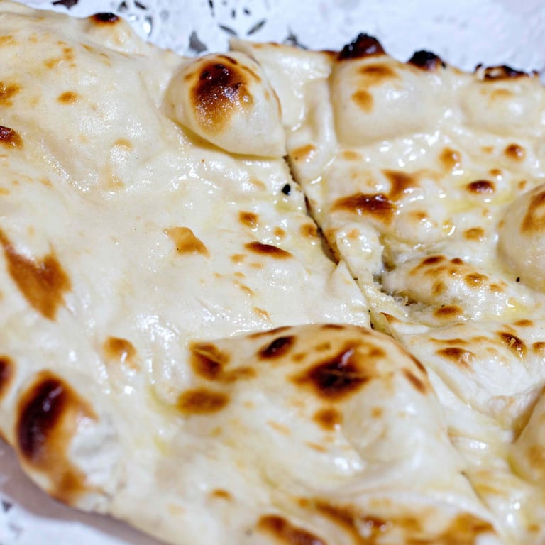 Delicious Naan Bread and Indian Cuisine Favorites